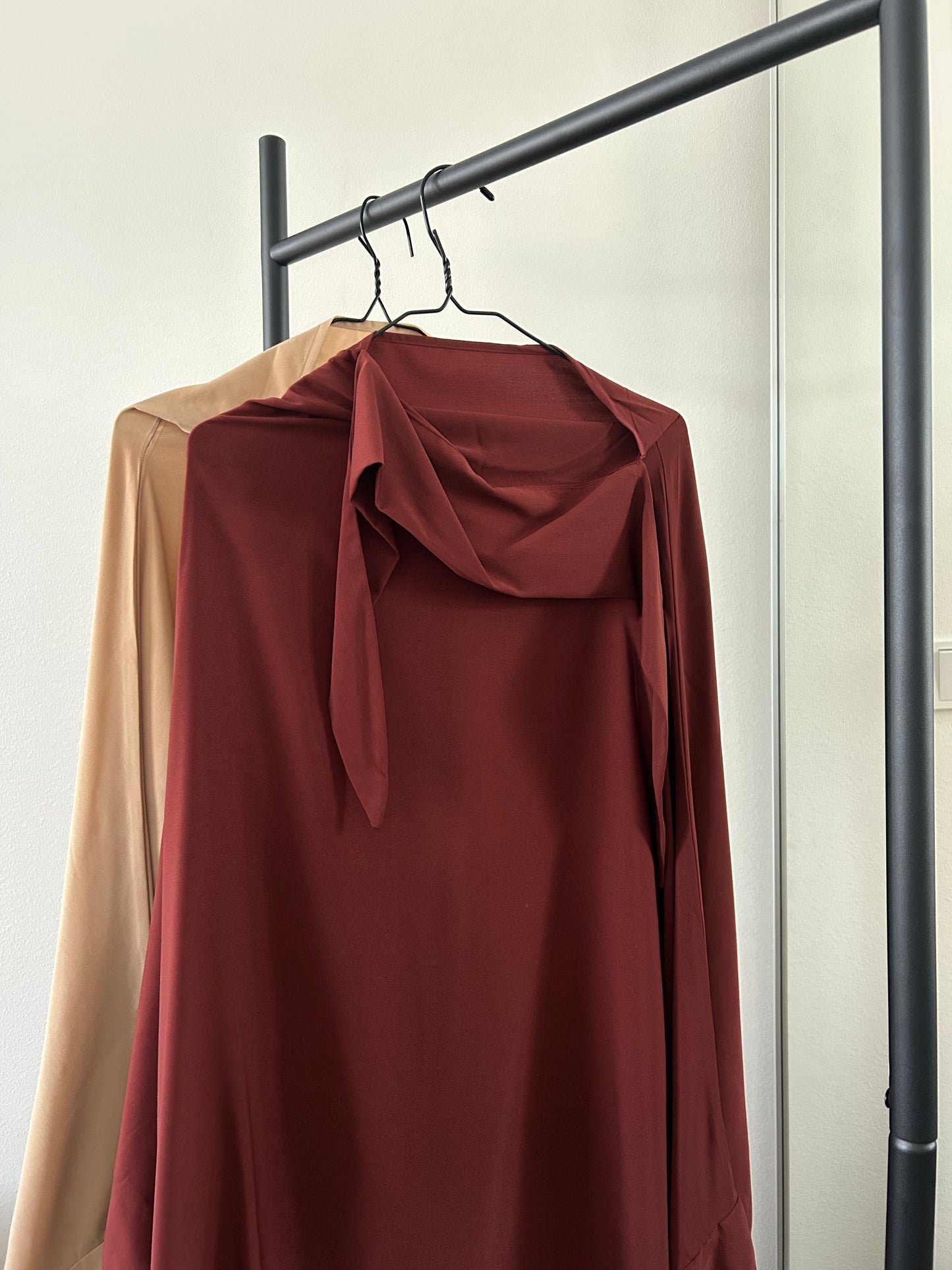 Autumn Ember Layla Khimar Set in a warm rust tone, designed with a flowing single-layer fabric for a comfortable, modest look.