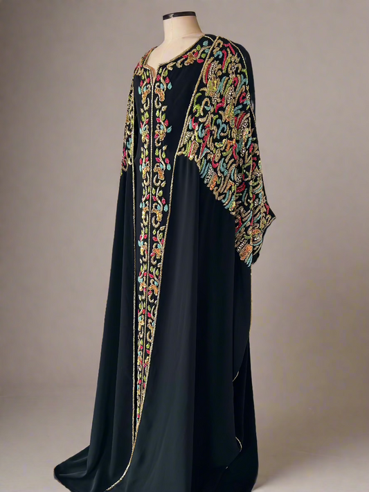 Full view of Malak Caftan - luxury two-piece Moroccan set on a mannequin, featuring intricate embroidery and an open butterfly abaya with a short-sleeve underdress.