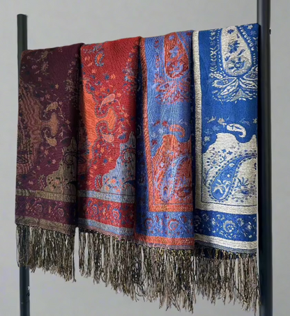 Lula Scarves in Blue Ocean, Blue Flame, Red Flame, and Deep Plum - a collection of vibrant and rich colors, showcasing the soft and luxurious feel of each scarf. Perfect for adding a touch of elegance and color to any wardrobe.